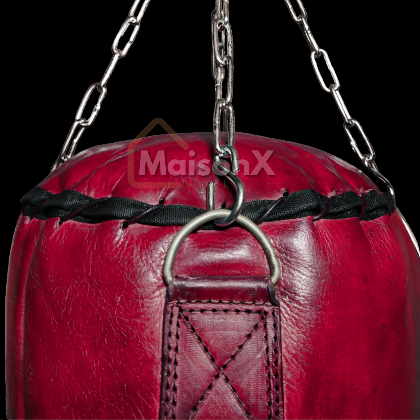 close up of vintage leather heavy bag of burgundy color, best punching bag for luxury admirer. burgundy leather punching bag hung against transparent background