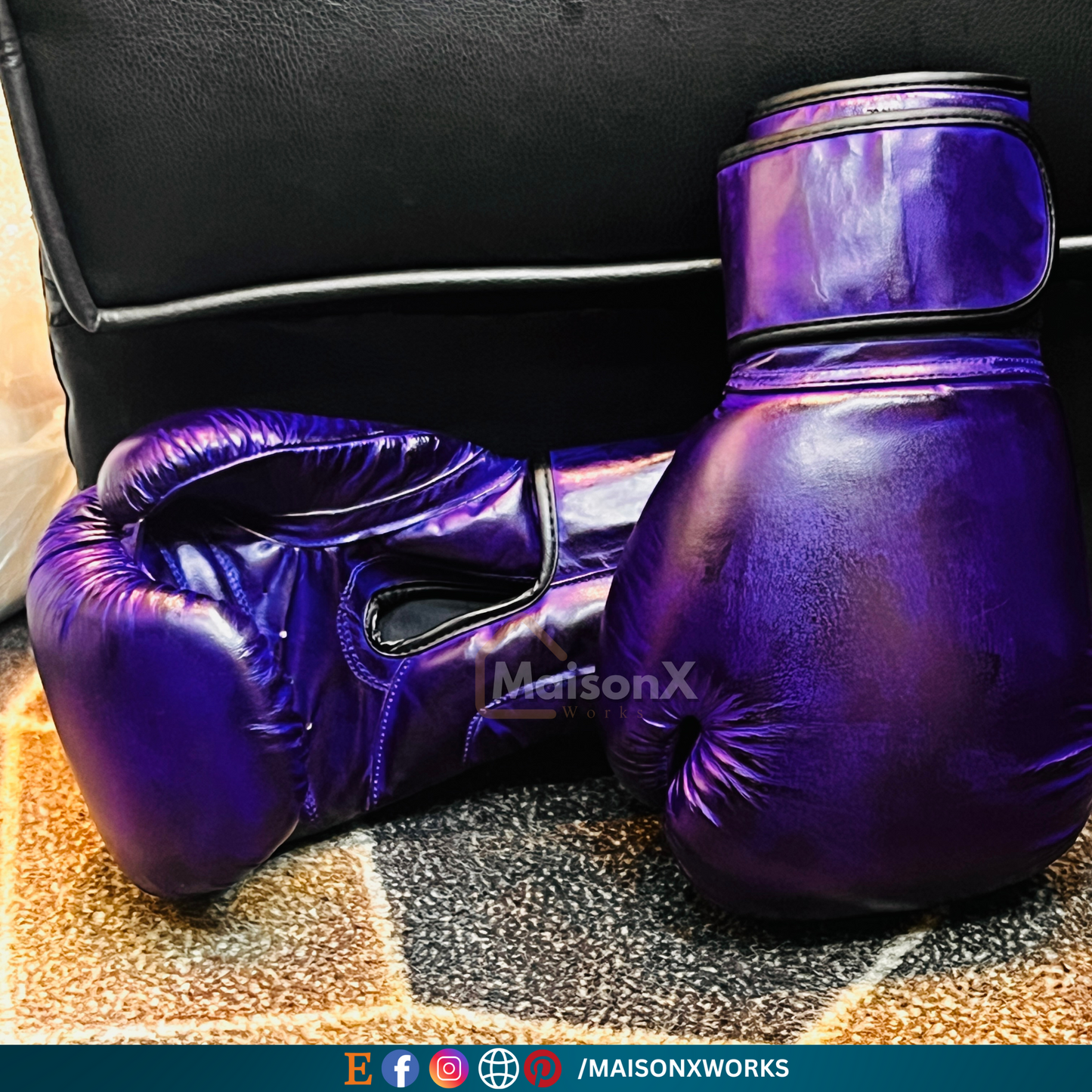 violet leather boxing gloves laying on the carpet of brown color