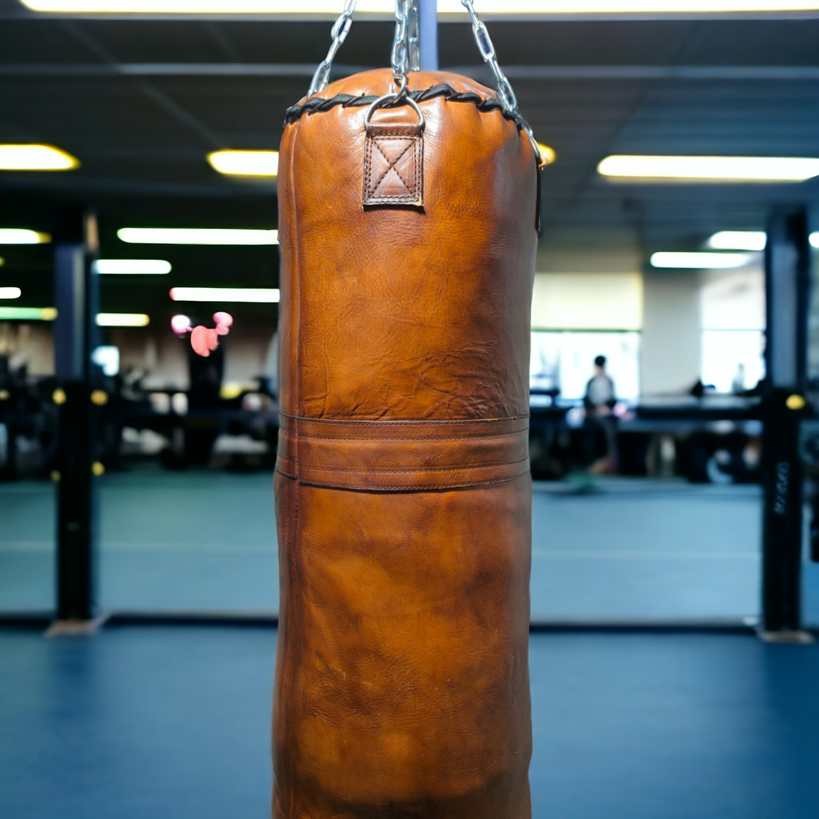 leather punching bag made from vegetable tan in a gym