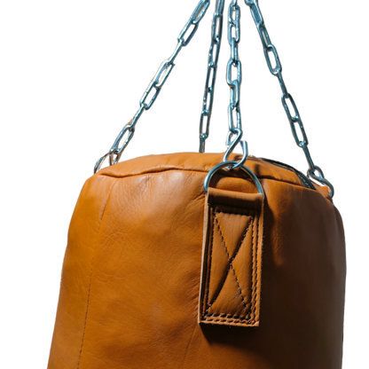 Handmade cowhide leather punching bag with reinforced stitching for durability and stainless steel chain