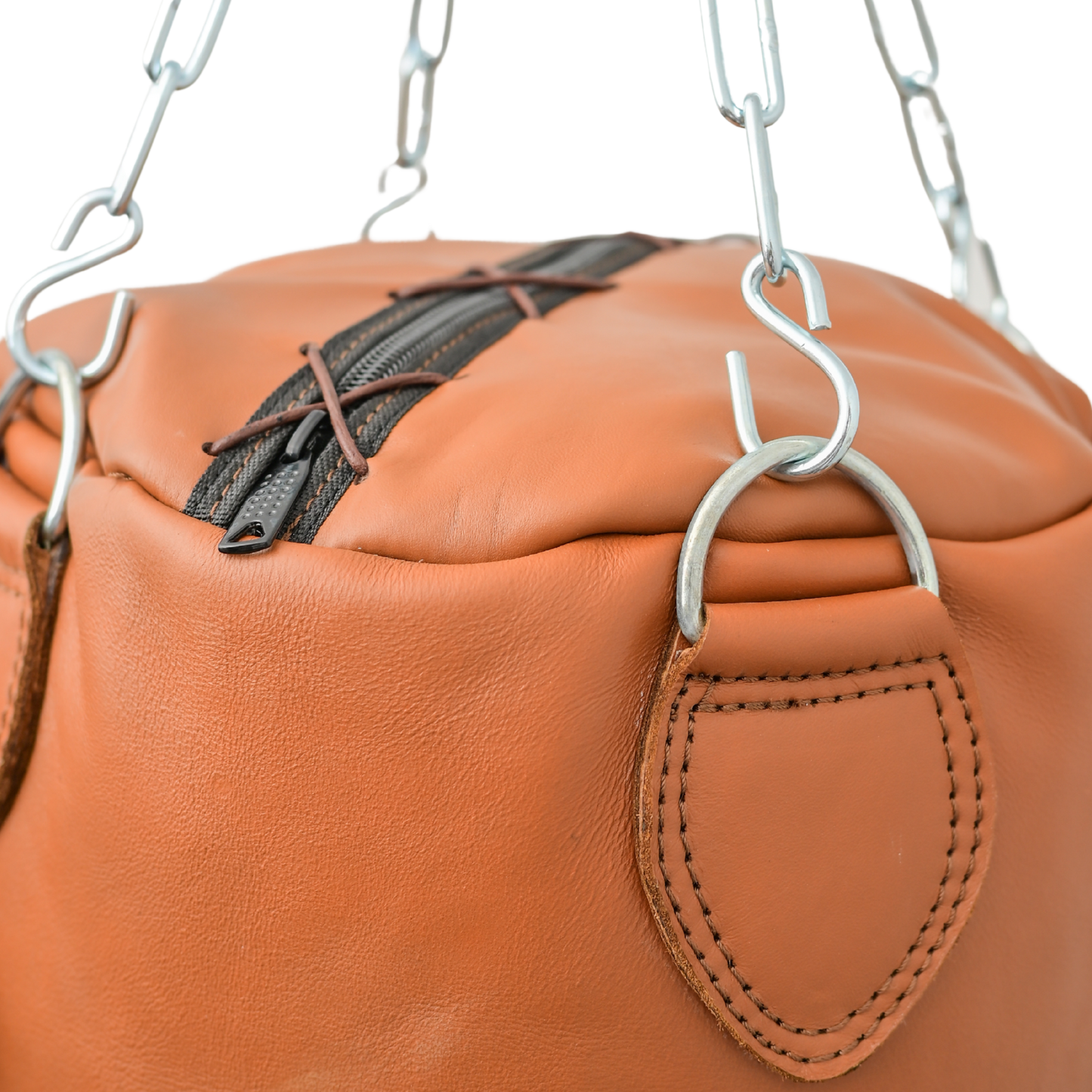 Close up of leather handmade punching bag from top with stainless steel chain