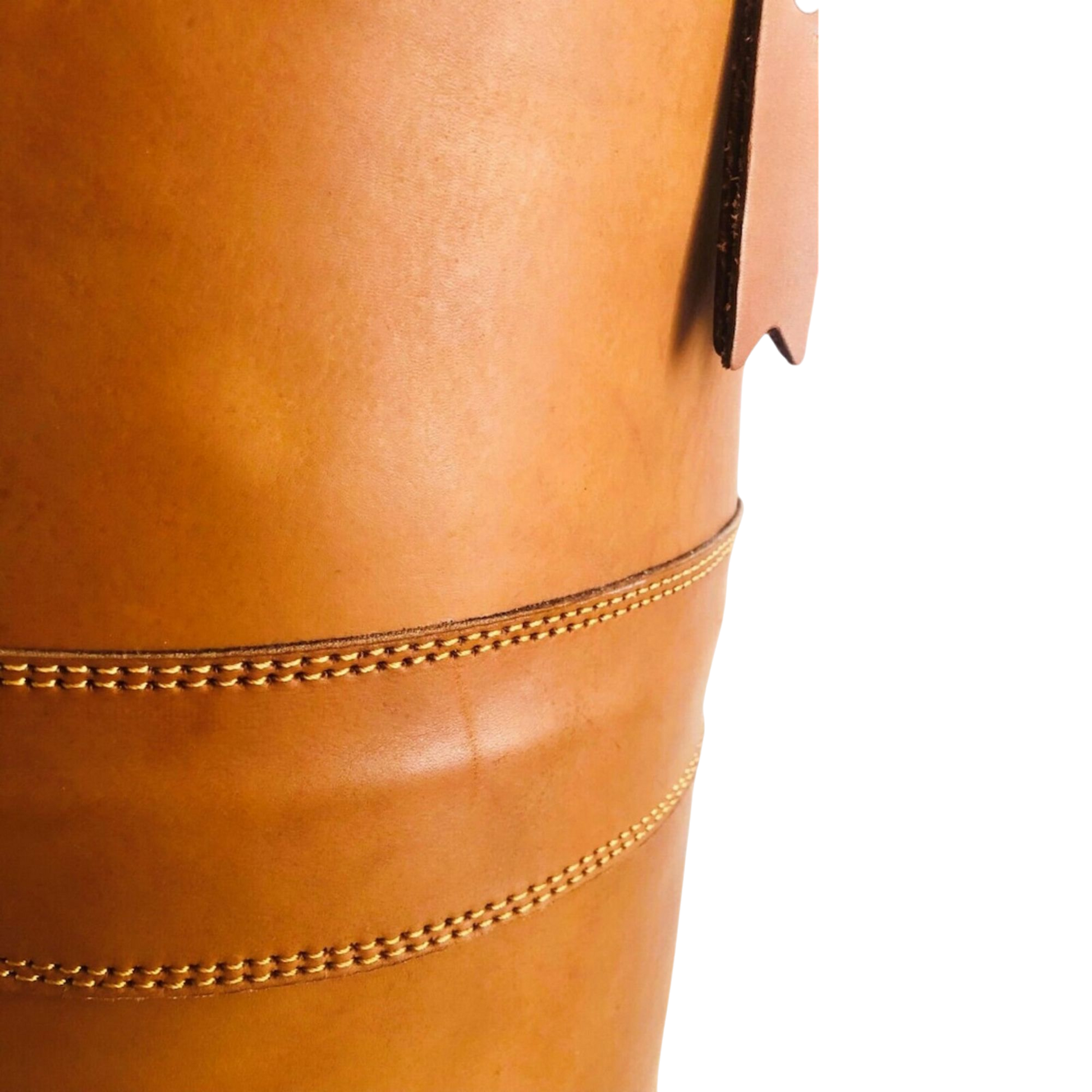reinforced stitching of leather punching bag close up
