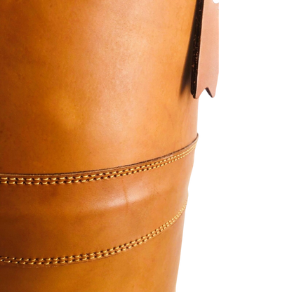 reinforced stitching of leather punching bag close up
