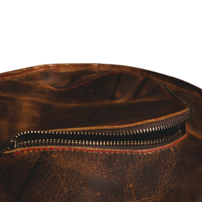 Close-up of handcrafted cowhide leather and stitching on punching bag.
leather punching bag, heavy bag, boxing bag, kickboxing bag, Muay Thai heavy bag, free standing punching bag, hanging punching bag, speed bag, double end bag, aqua training bag, water heavy bag, uppercut bag, maize bag, wrecking ball bag, reflex bag, cobra bag, training dummy, professional heavy bag, gym punching bag, home gym heavy bag, filled punching bag, unfilled heavy bag, synthetic leather punching bag, durable heavy bag, 100lb pun